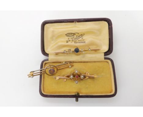 Three 9ct gem set and pearl brooches, weight together 6.3gms Condition Report: Available upon request