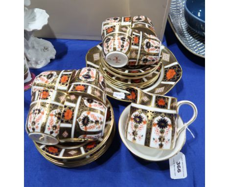 A Royal Crown Derby teaset in 1128 imari pattern comprising eight cups, saucers and plates, cake plate, milk jug and sugar bo