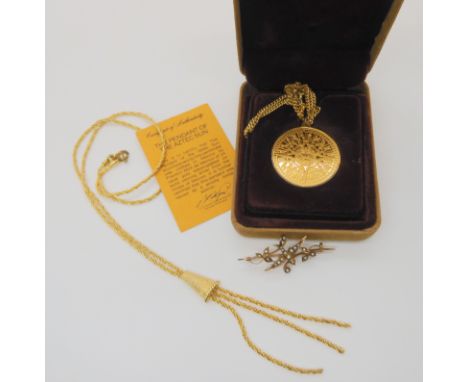A 9ct gold pearl set swallow brooch, weight 2.5gms, a silver Aztec pendant etc Condition Report: Available upon request