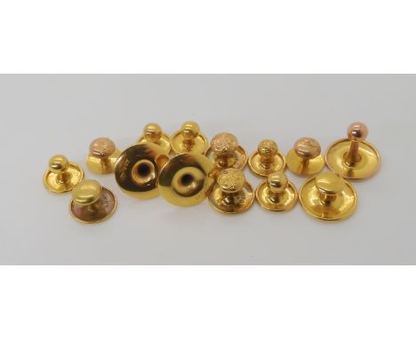 A collection of 9ct shirt studs, weight 9.1gms, and a single 15ct gold example weight 0.7gms Condition Report: Available upon