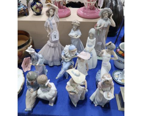 A collection of Lladro and Nao figures and one other figure (11) Condition Report: girl with closed parasol missing a finger.