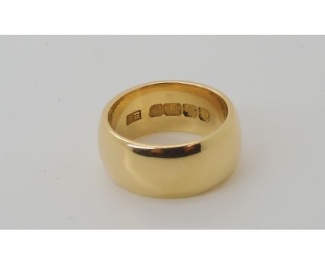 An 18ct gold wide wedding band, size G1/2, weight 8.5gms Condition Report: Available upon request