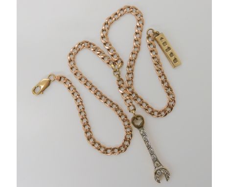 A 9ct gold curb chain necklace with a 9ct gold spanner and ingot pendants length 46cm, weight 23.4gms Condition Report: Avail