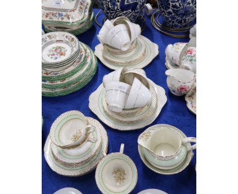 A Paragon teaset, pattern number A1717 decorated with Harebells, comprising twelve cups, saucers and plates, milk jug, sugar 