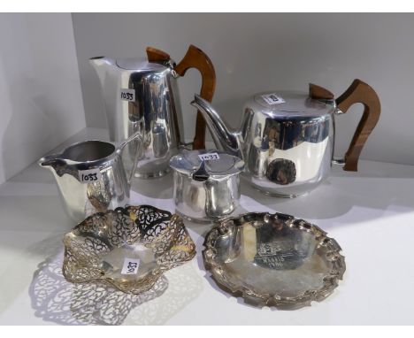 A lot comprising a four piece Picquot ware tea service, an EP bon bon dish &amp; a card tray Condition Report: Available upon