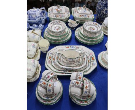 A Copeland Spode Chinese Rose pattern tea and dinner service comprising two tureens and covers, graduated platters, dinner pl