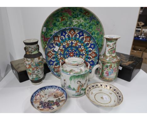 A large Chinese dish decorated with chrysanthemums, a famille verte vase, two saucers, a teapot and a satsuma vase and two la