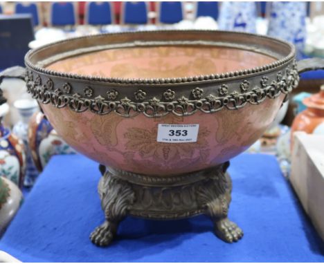 A large decorative ceramic bowl in a gilt metal stand, 22cm high Condition Report: Available upon request