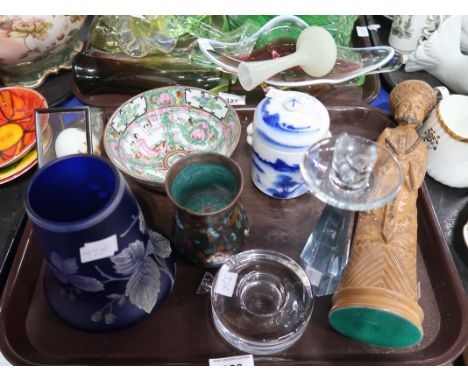 An enamelled blue glass vase, a cloisonne vase, a carved figure of a warrior, a famille rose bowl, a blue and white tea caddy