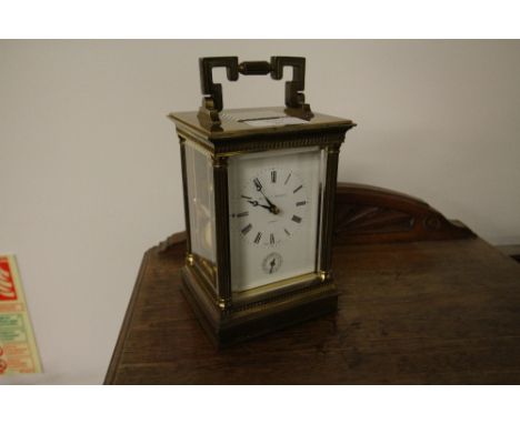Matthew Norman brass and bevelled glass carriage clock, No. 1750, with alarm function, 16.5cm high
