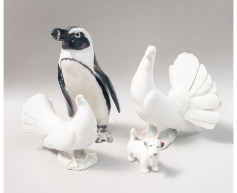 A Copenhagen Bing and Grondahl Porcelain Model of a Penguin, model number 1822, together with a similar model of a dog and tw