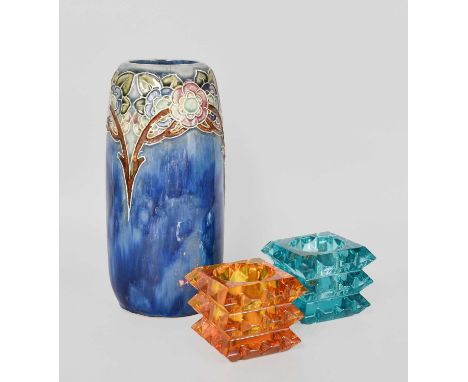 Two Baccarat Glass Candle Holders, one amber, the other teal, both with acid edged marks, together with a Royal Doulton stone