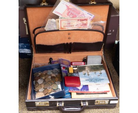 A Collection of Coins and Banknotes, including: a selection of mostly 20th century world banknotes, including some fantasy is