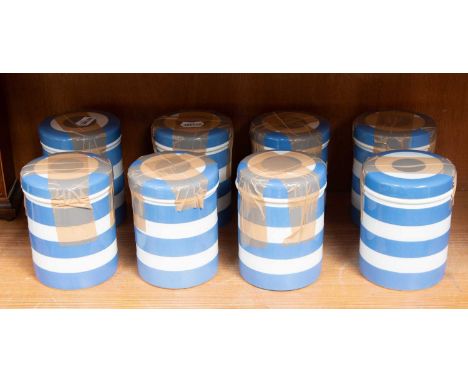 T G Green Cornish Ware, eight blue banded storage jars, of cylindrical formProvenance: A Private Collection in the Lake Distr