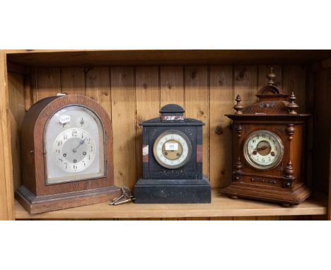 A Black Slate and Marble Striking Mantel Clock, circa 1900, twin barrel movement striking on a bell, 31cm high, together with