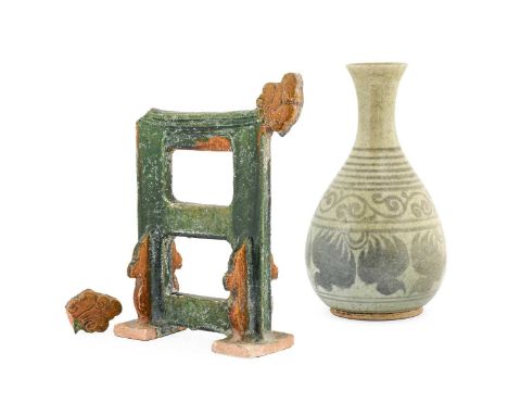 A Chinese Sancai Glazed Earthenware Funerary Gate or Screen, Ming Dynasty, of rectangular form with cloud scroll angles on tr