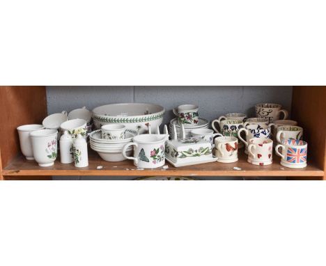 Ten Various Emma Bridgewater Pottery Mugs and a quantity of Portmeirion Botanic Garden Pottery (one shelf)