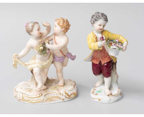 A Meissen Porcelain Figure Group, late 19th century, as a pair of dancing putti holding a floral wreath, on rococo style base