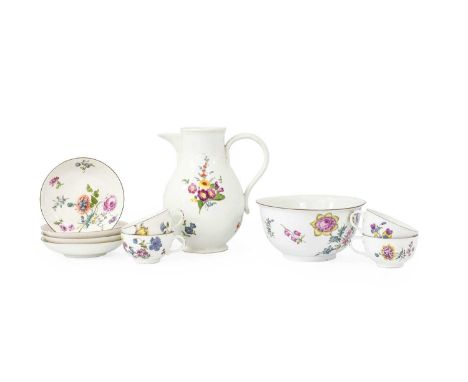 A Set of Four Meissen Porcelain Teacups and Saucers, circa 1745, painted with flower sprays and scattered sprigs within brown