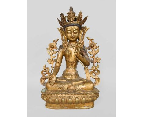 A Sino-Tibetan Bronze Statue of the Female Buddha Tara, on lotus plinth, 43cmNo breaks or losses. Some oxidation.