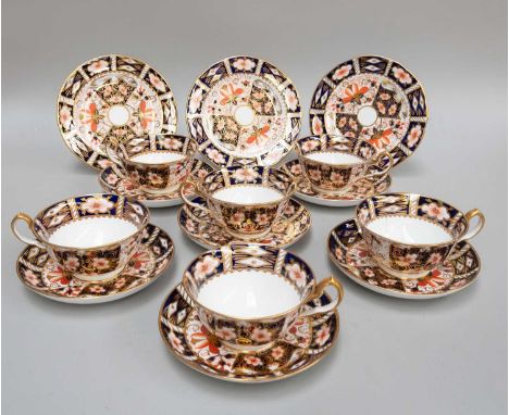 A Collection of Imari Pattern Royal Crown Derby Tea Cups and Saucers, to include - three side plates, and six tea cups and sa