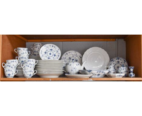 A Royal Copenhagen Porcelain Dinner and Tea Service, "Musselmalet" or "Blue Fluted" pattern, comprising: 12 dinner plates 12 