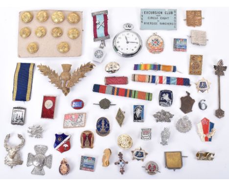A mixed lot to include a number of military buttons, a Timex pocket watch, some military ribbons and enamel badges (qty)