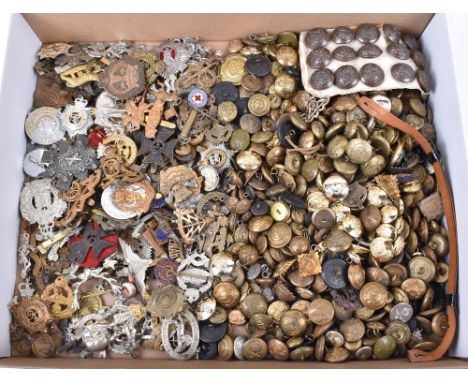 A large selection of military badges and officers tunic buttons, including some reproduction, with fifteen Officer button on 