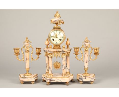 19th/20th century three piece French marble and ormolu clock set, mantel clock supported on four pillars. Enamel dial decorat