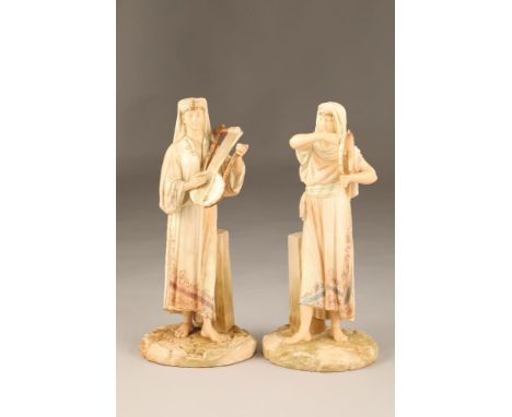 Pair Royal Worcester figures, Eastern robed musicians. Model no 1084, RHN 26651. 32.5cm high