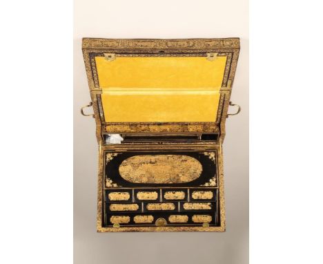 19th century Chinese lacquer writing box. Decorated with gilt chinoiserie decoration on black ground. The lid rising to revea