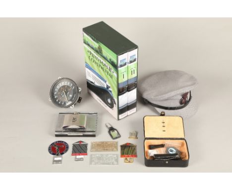 Collection of Rolls-Royce memorabilia, including three car badges, two plaques, assorted key rings, dice set, hip flask, a sp