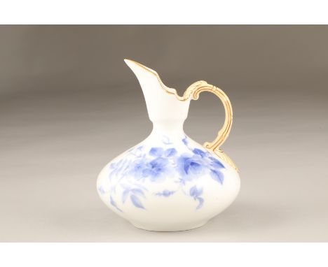 Royal Worcester China works ewer, squat form, hand painted with blue roses. Date coded 1897. 15cm high