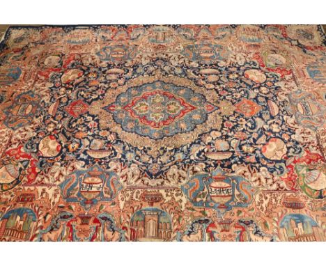 A fine Persian rug, rectangular, blue ground with assorted panels depicting temples, urns, deer and birds in a rich palette o