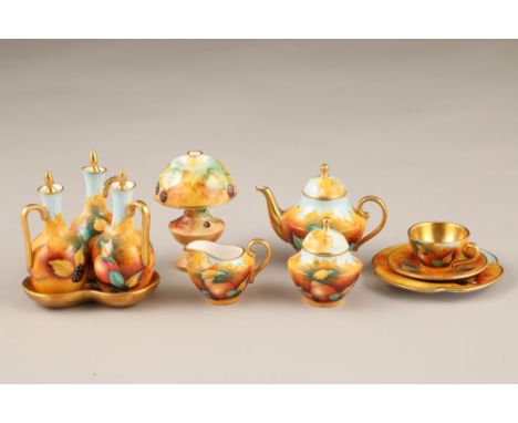 Six piece Caverswall bone china miniature tea set, a Caverswall miniature bone china lamp and shade and a Caverswall bone chi