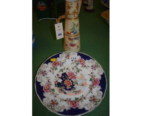 A Royal Worcester ewer with floral decoration on blush ground, no. 17019/1047; together with an Ironstone plate.  (2)