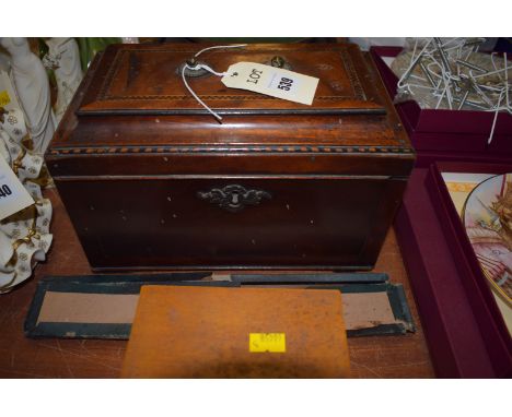 A George III inlaid mahogany tea caddy, the rectangular top decorated with herringbone and barber-pole banding (missing handl