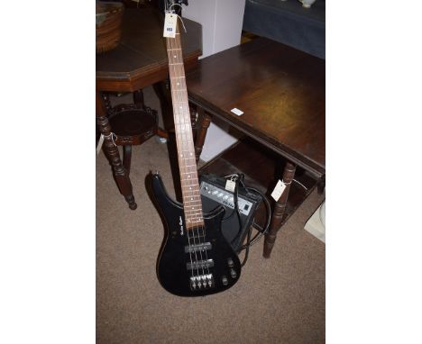 A Harley Benton electric guitar; together with an Elevation ED-10J amplifier.  (2)