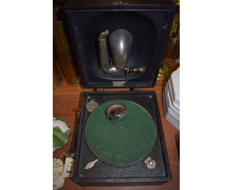 A vintage wind-up travelling gramophone.