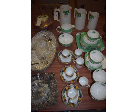 A Royal Paragon Art Deco style part tea service; a Grosvenor coffee set; three graduated jugs; a Noritake gilt bowl and cover