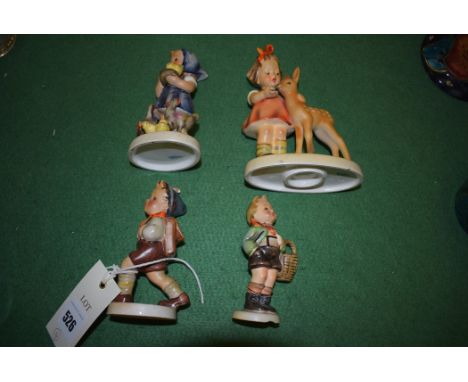 Four Hummel figures of children, to include: a girl with a fawn.  (4)