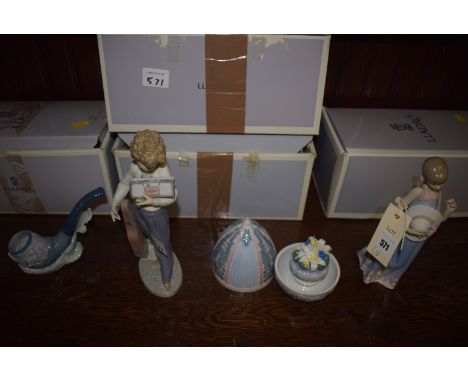 Lladro figures of a boy and girl; an egg-shaped ornament with internal floral decoration; together with a pipe and stand (wit