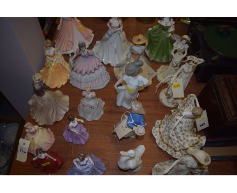 A collection of figures, to include: Nao; The Leonardo Collection; Coalport; etc.