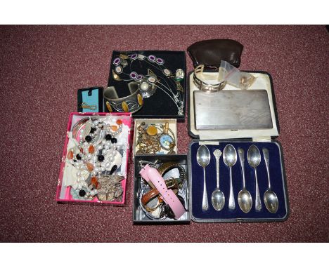 Silver teaspoons; a gold locket pendant; and a silver cigarette case with engine turned decoration, by Adie Bros.