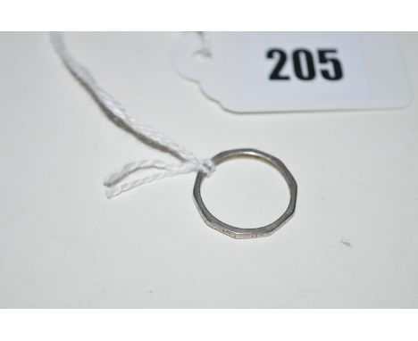 An engraved platinum ring, ring size K 1/2, 2.2grms.