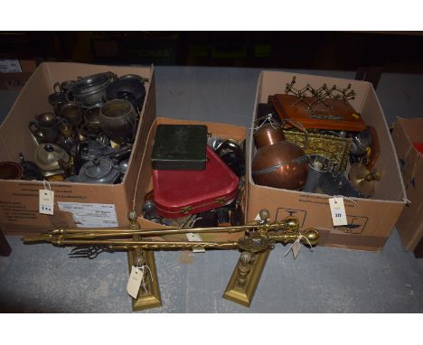 A large quantity of metal ware to include a punch ladle, brass fireside implements, trophies and teaware.