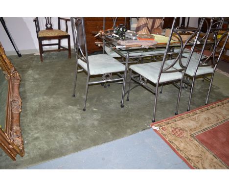 A Chinese style green carpet, with cut floral design throughout.