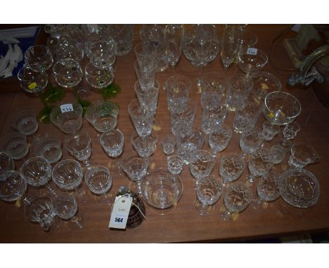 A collection of glassware, to include: cut glass; drinking vessels; a decanter; jugs; a red flash atomiser; etc.