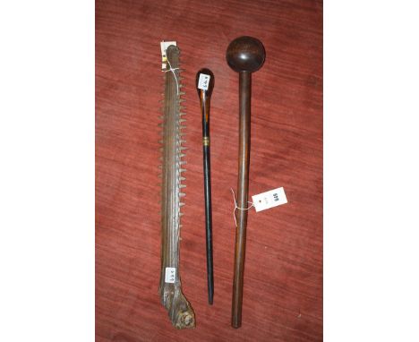 A hardwood knobkerrie; a swagger stick with inlaid decoration; together with a swordfish bill.  (3)