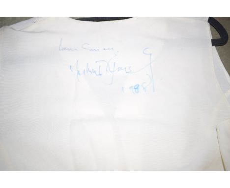 A blouse signed by Michael Jackson, dated 1988.